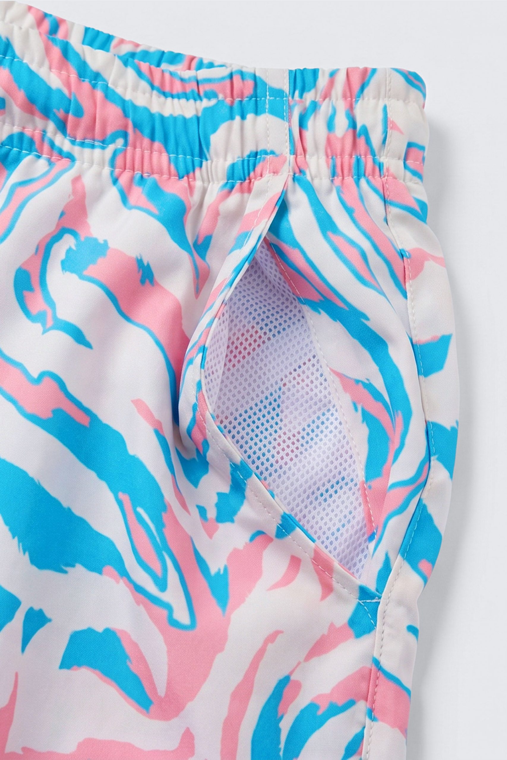 Beast-Vibes-Wave-Board-Shorts_BLU-PINK_pocket-1.jpg