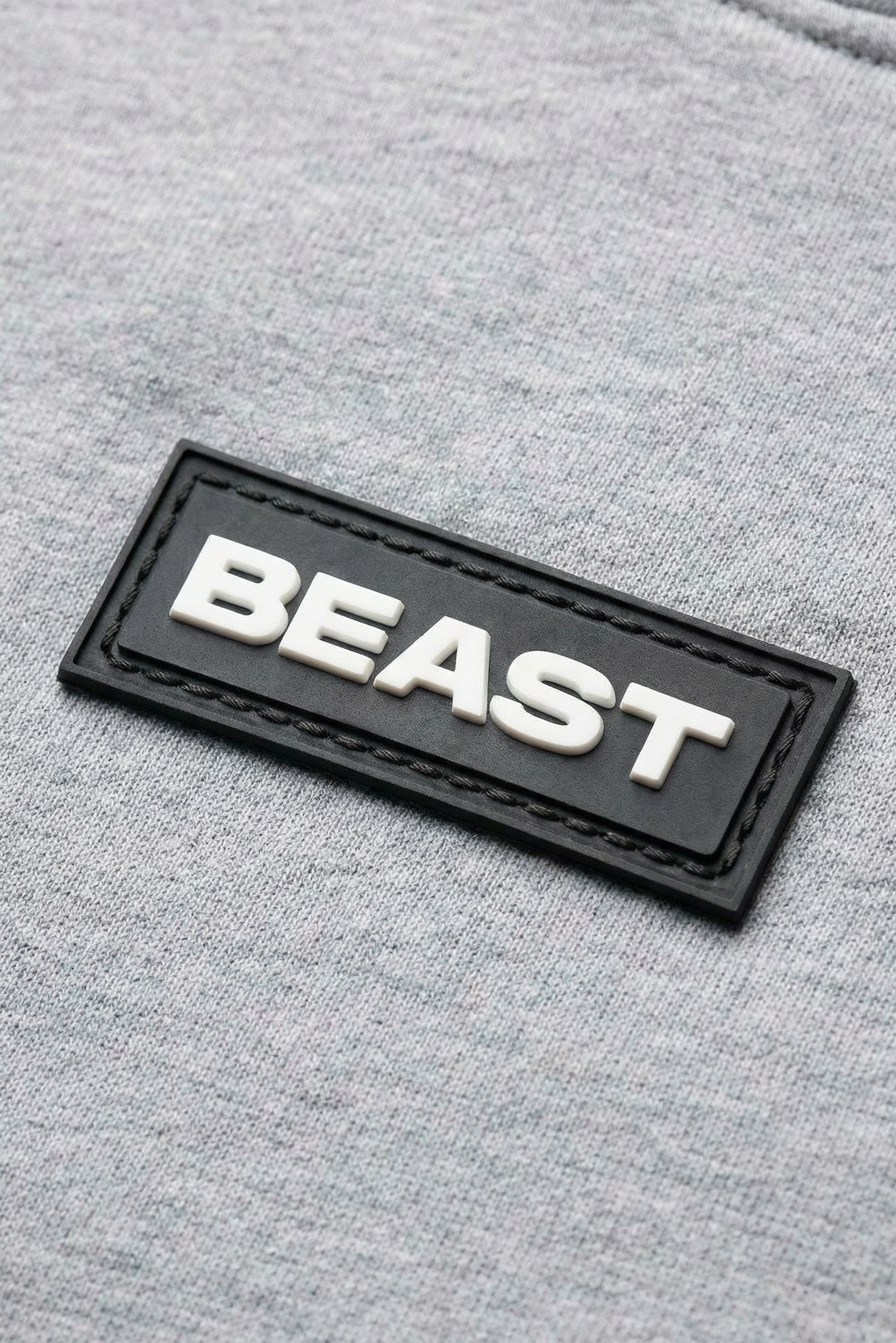 Youth-Stealth-Hoodie-Heather-close-up-1.png