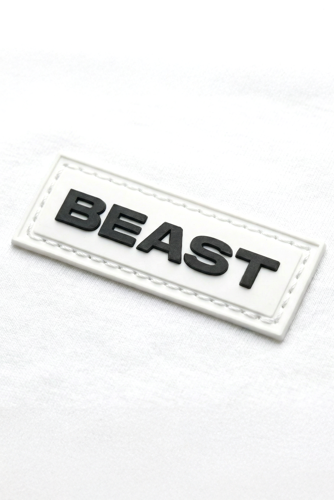 Youth-Stealth-Hoodie-White-close-up-1.png